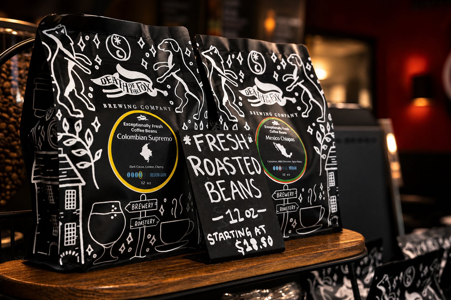 Fresh roasted beans sign beside bags of coffee at the roastery