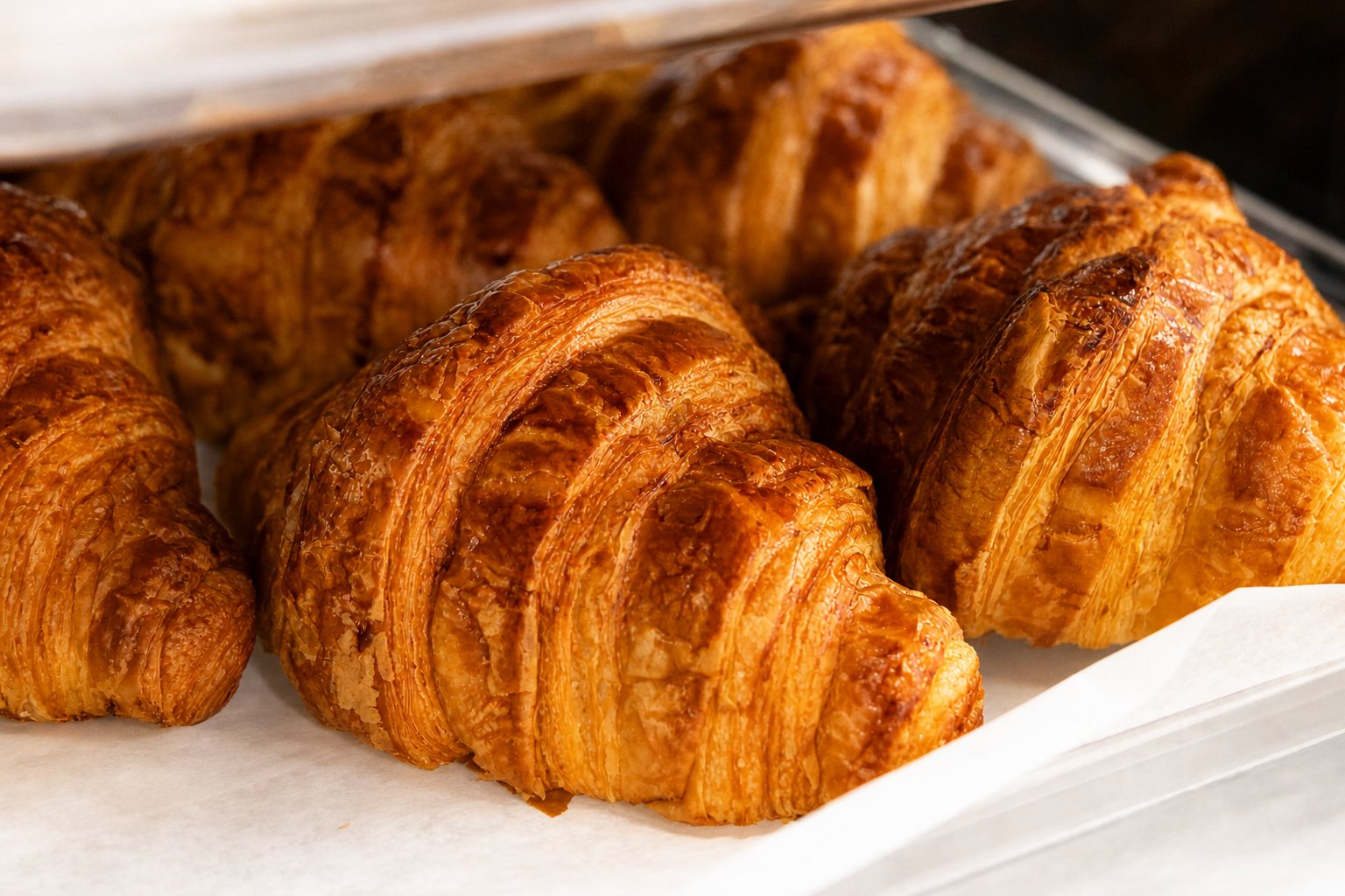Tray of golden butter croissants