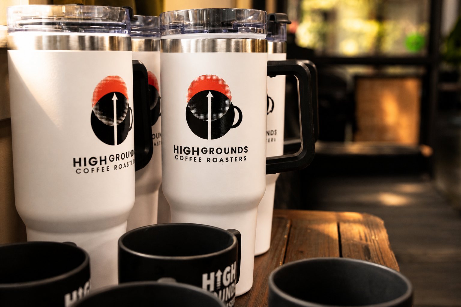 High Grounds travel tumblers and mugs on display